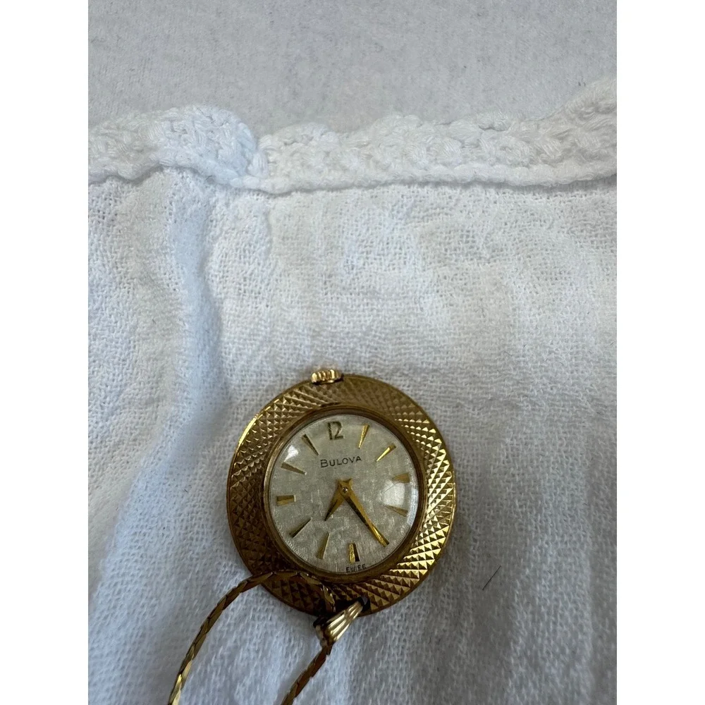 Vintage Bulova Womens OS Pendant Watch Necklace Gold Textured Bezel Swiss Made
